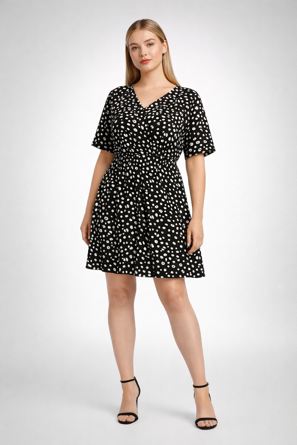 Black short dress with white dot print and button front
