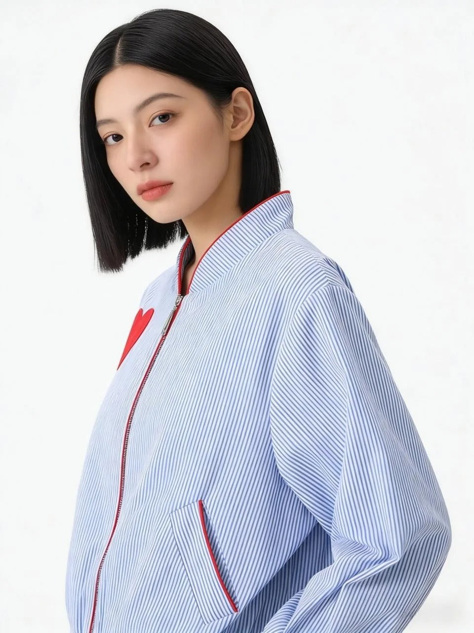 Light blue striped zip jacket with red heart patch