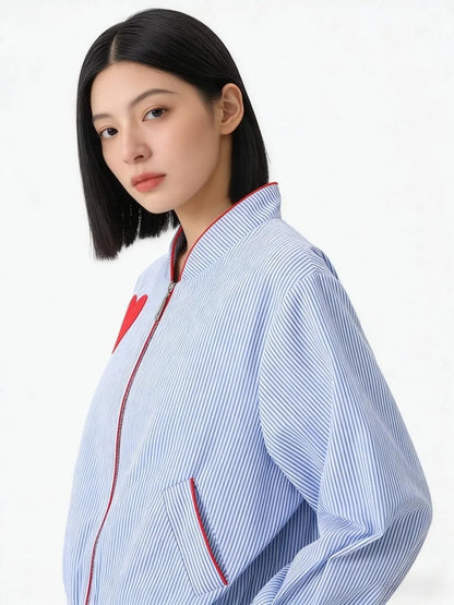 Light blue striped zip jacket with red heart patch