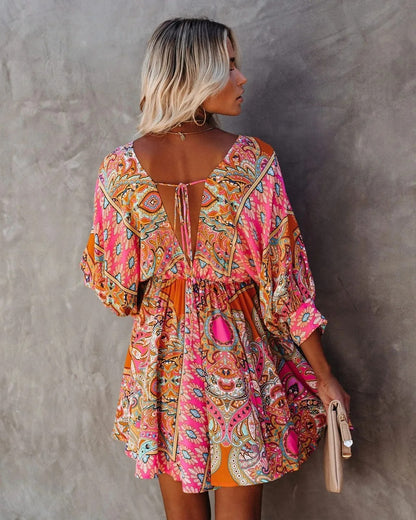 Multicolor mini dress with paisley print and deep V-neck